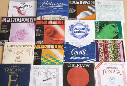 Sets of violin strings including Dominant, Jargar, Infeld, Helicore and Larsen